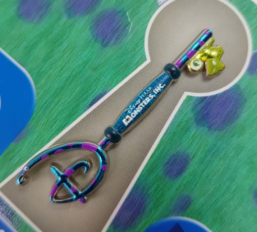 Disney Store Monsters Inc 20th Anniversary Replica Key Pin Trading Badge